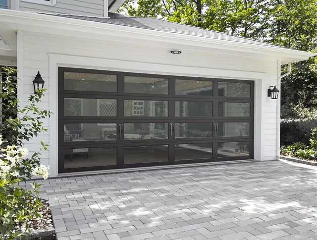 Pompano Beach Garage Door Repair design specialist presenting custom garage door options to Pompano Beach homeowner