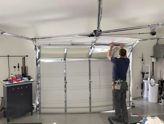 Pompano Beach Garage Door Repair specialist performing precise section replacement on Pompano Beach garage door